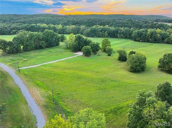 13.9 Acres of Recreational & Residential Land for Sale in Collins, Missouri