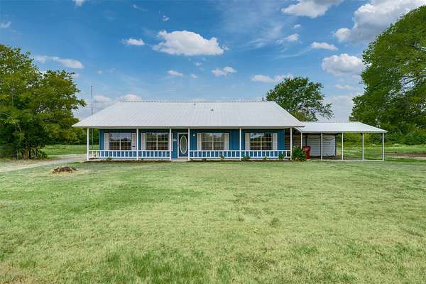 9.46 Acres of Land with Home for Sale in Bogata, Texas
