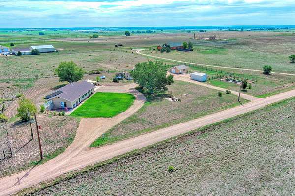 6.18 Acres of Land with Home for Sale in La Salle, Colorado