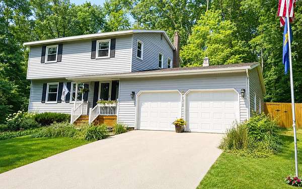 2 Acres of Land with Home for Sale in Alto, Michigan