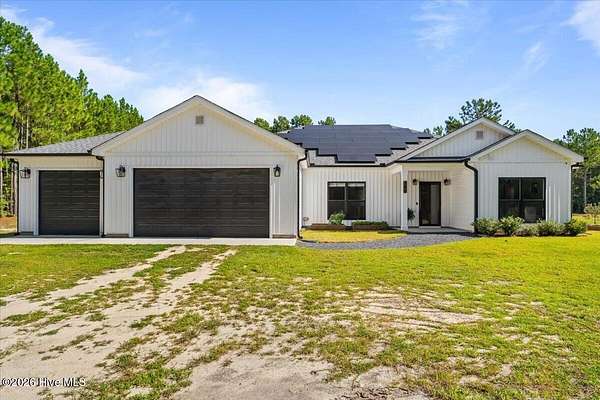 10.1 Acres of Land with Home for Sale in Pinebluff, North Carolina