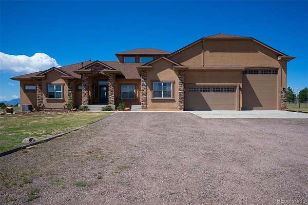 5 Acres of Land with Home for Sale in Falcon, Colorado