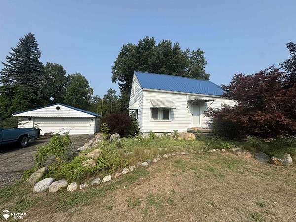 4 Acres of Land with Home for Sale in Flushing, Michigan