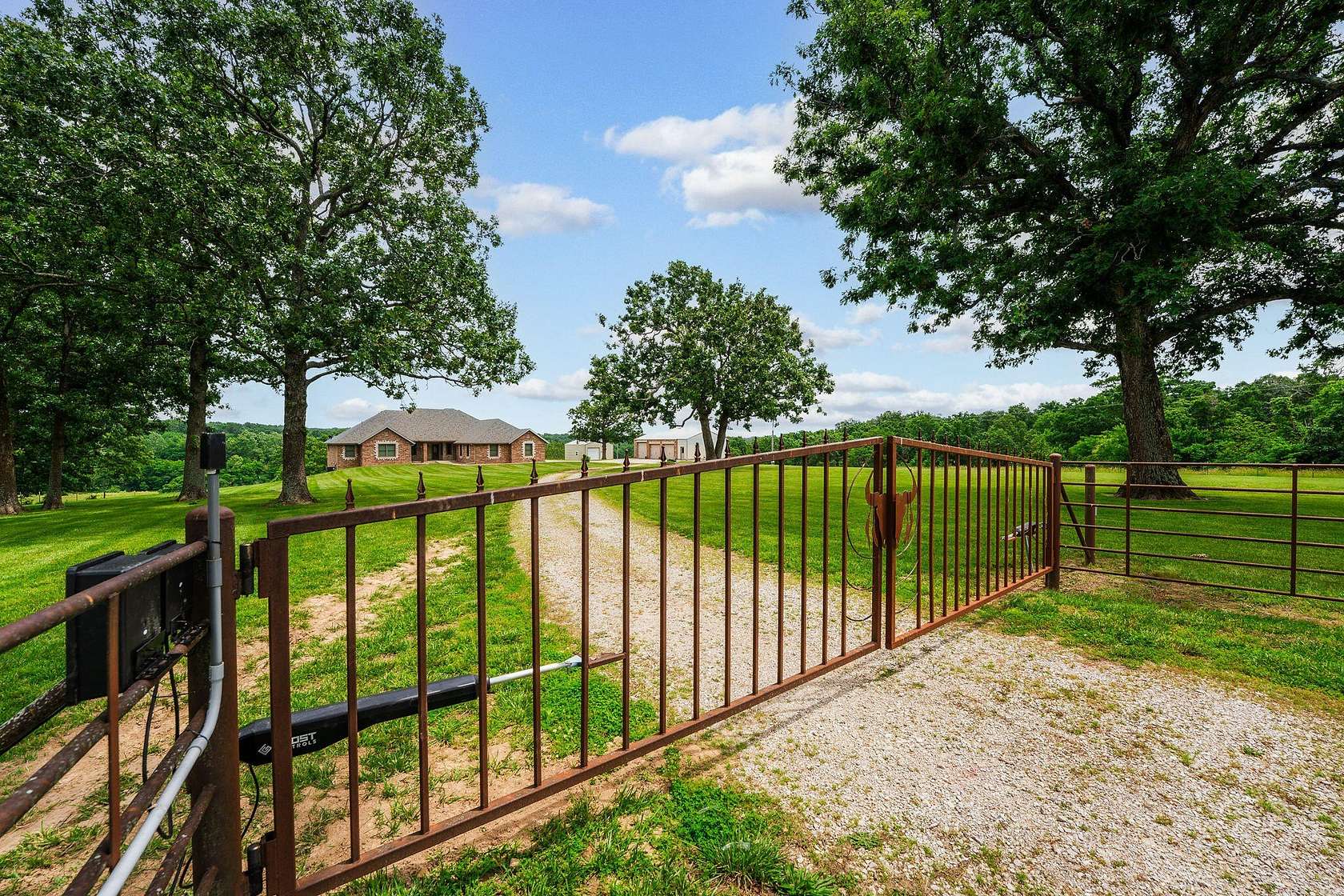 62.5 Acres of Recreational Land with Home for Sale in Marshfield, Missouri