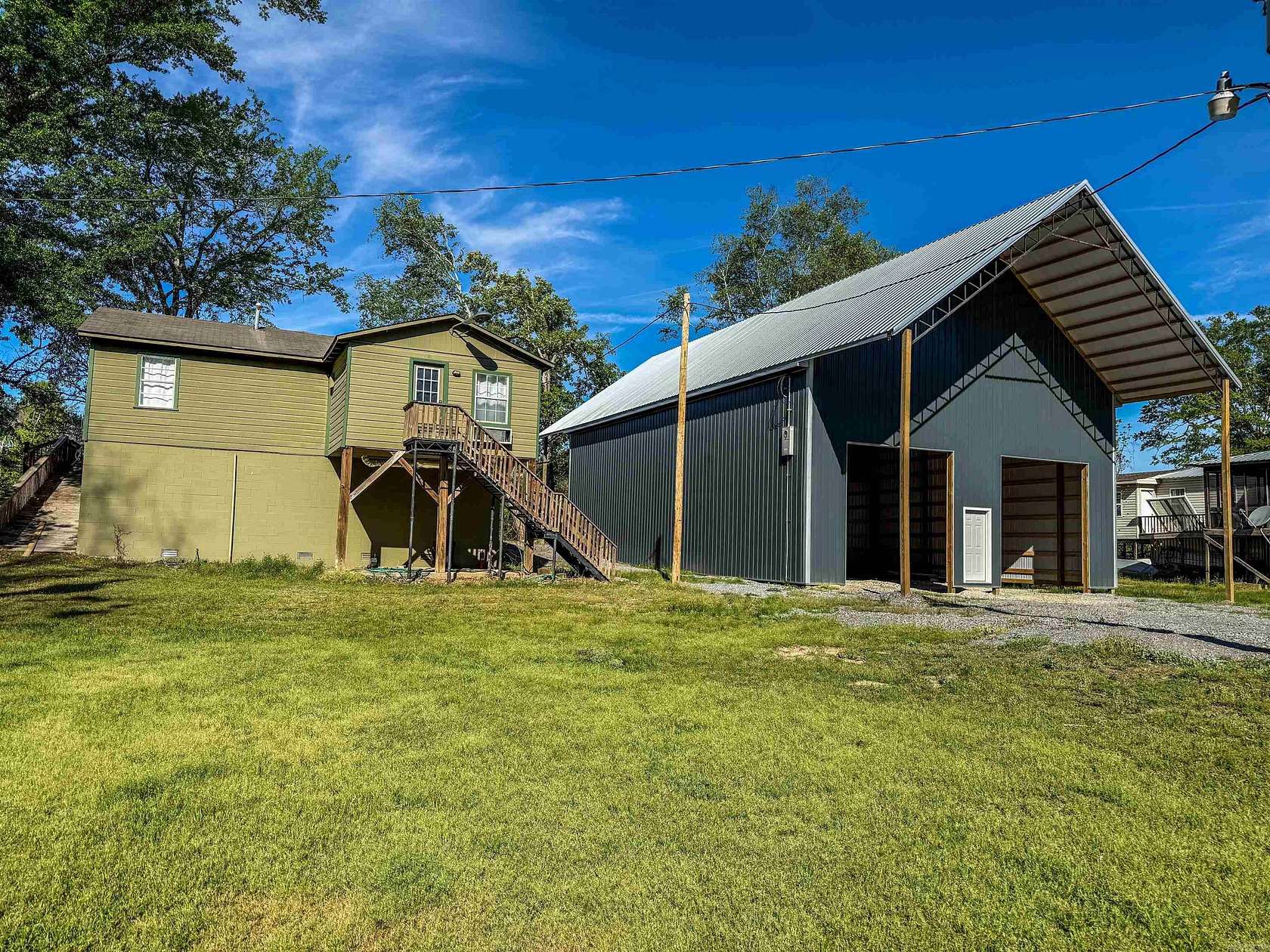 1.76 Acres of Land with Home for Sale in Holly Grove, Arkansas