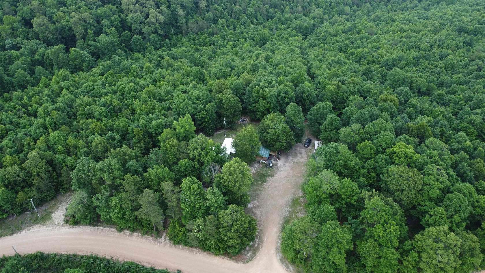 26.7 Acres of Land with Home for Sale in Harriet, Arkansas
