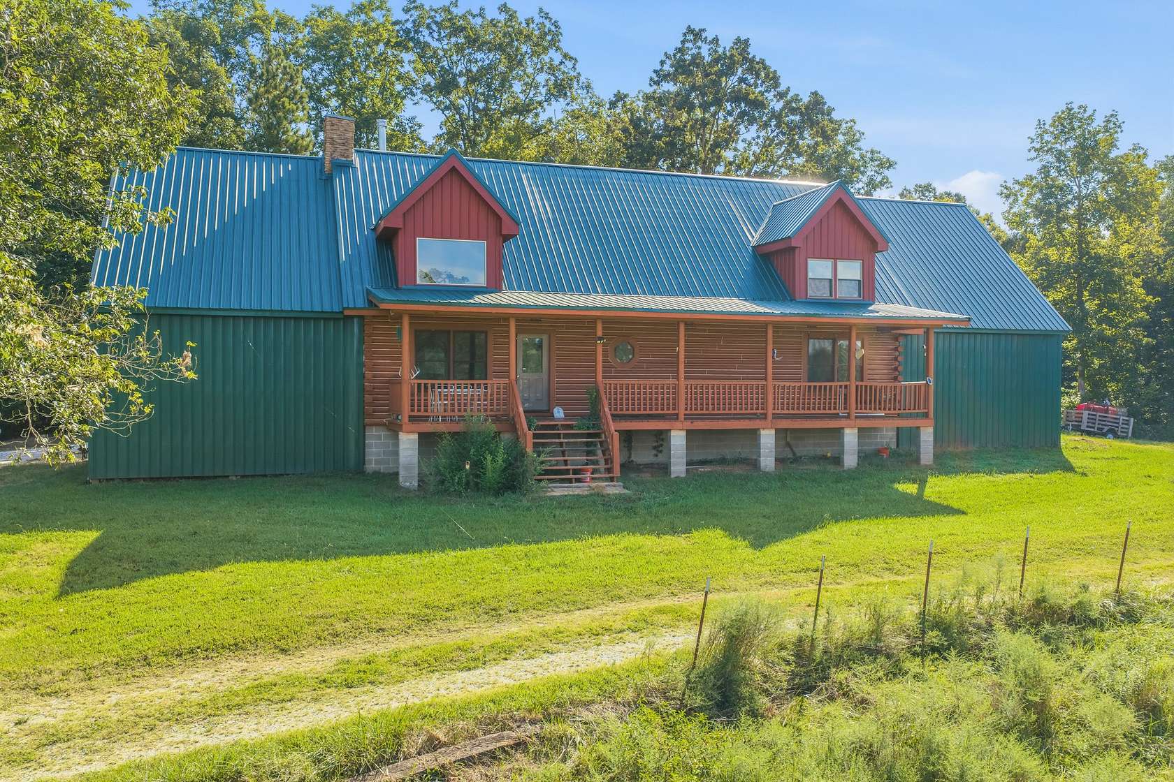 23.7 Acres of Land with Home for Sale in Parsons, Tennessee