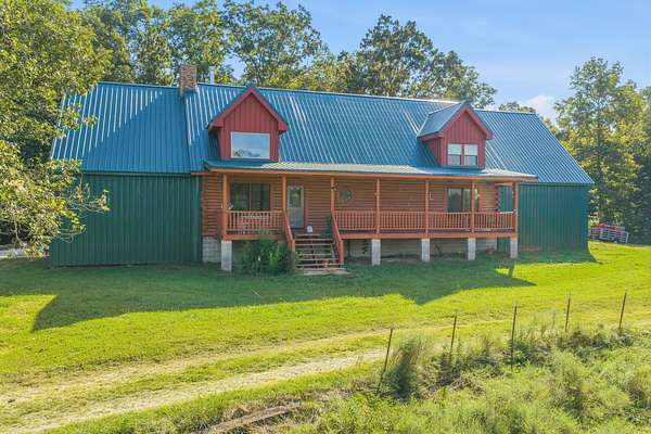 23.7 Acres of Land with Home for Sale in Parsons, Tennessee