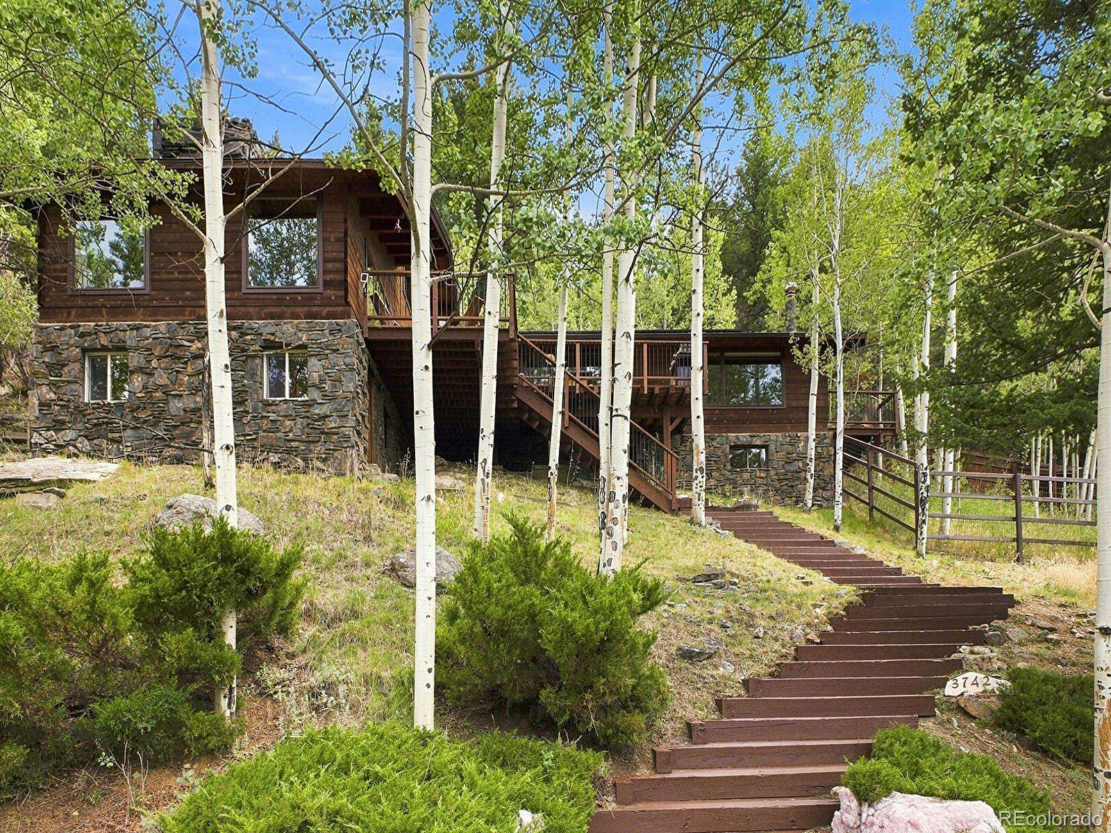 15 Acres of Land with Home for Sale in Evergreen, Colorado