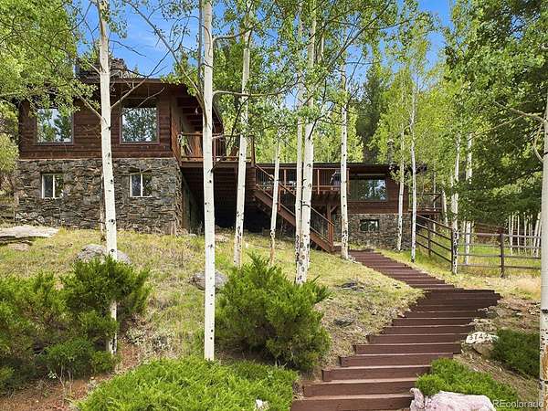 15 Acres of Land with Home for Sale in Evergreen, Colorado