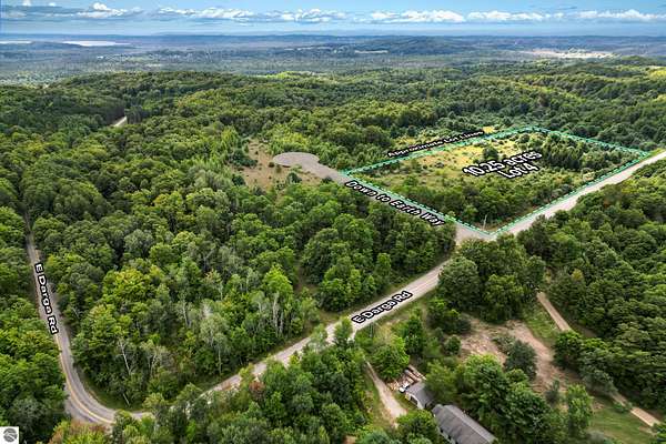 10.3 Acres of Recreational & Residential Land for Sale in Cedar, Michigan