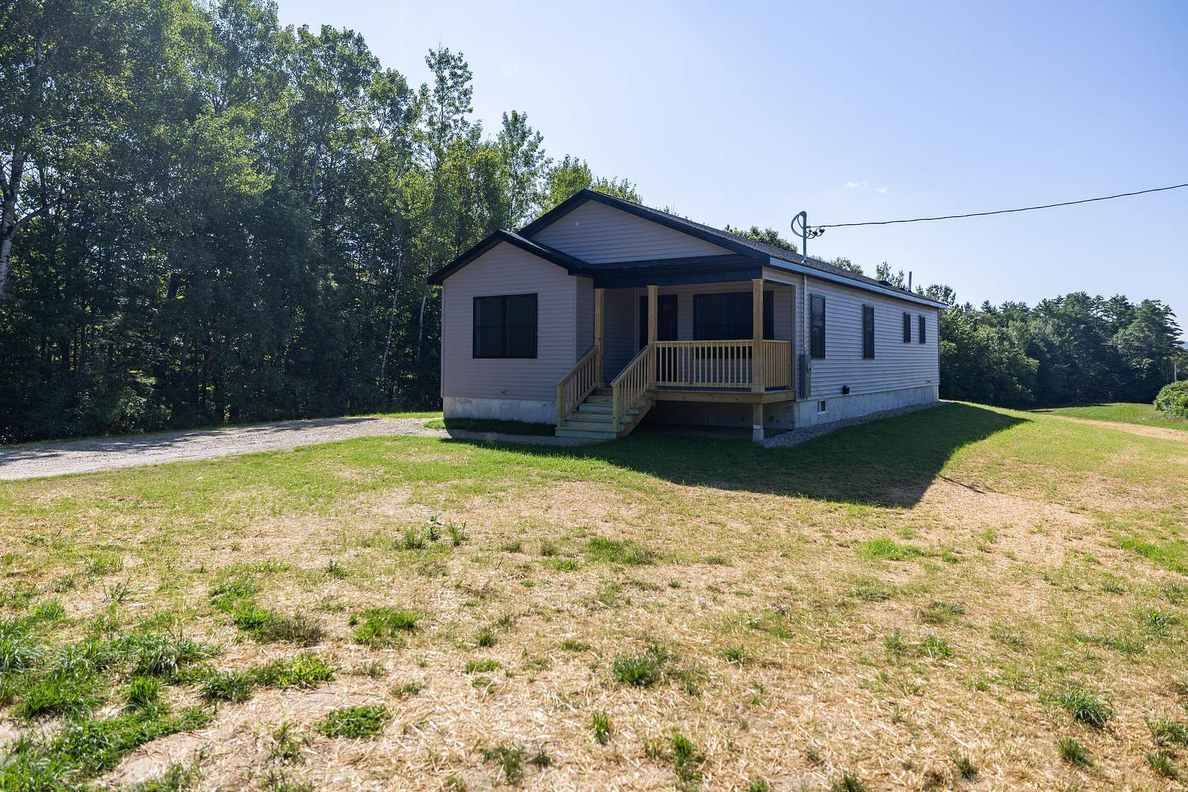 5.86 Acres of Land with Home for Sale in Leeds, Maine