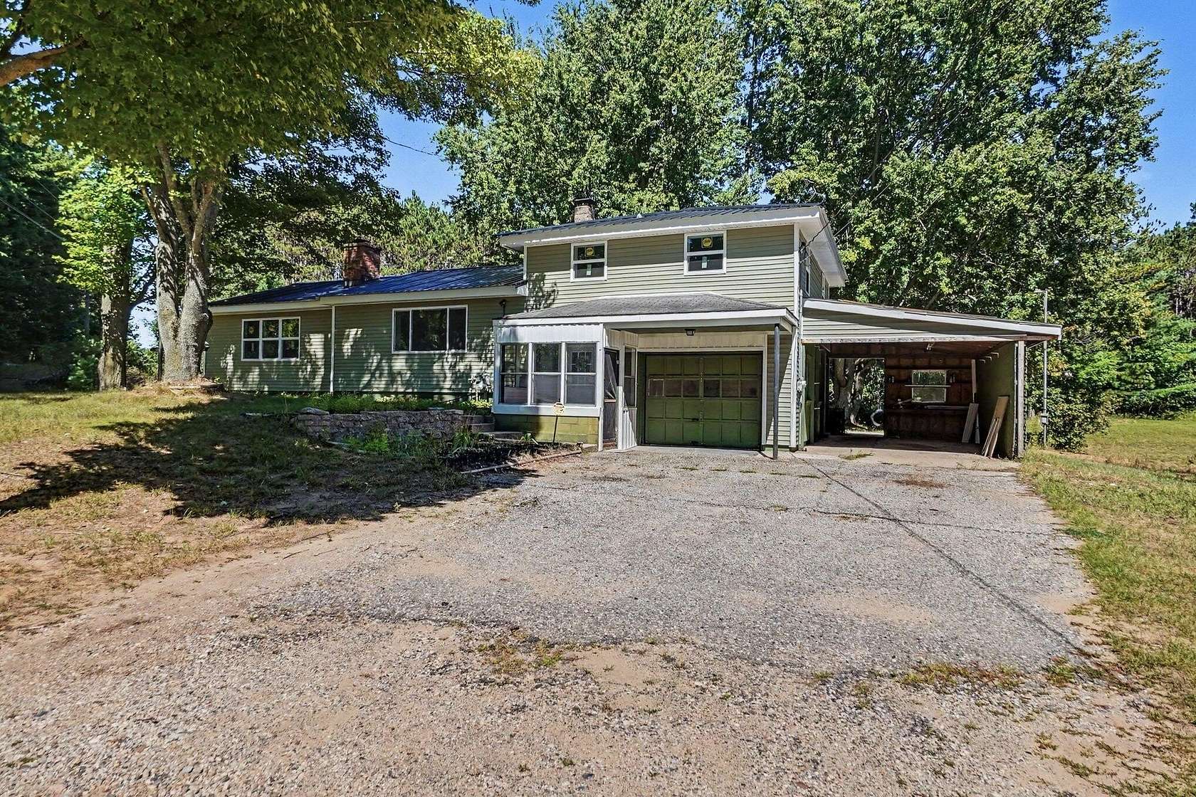 3.25 Acres of Land with Home for Sale in White Cloud, Michigan