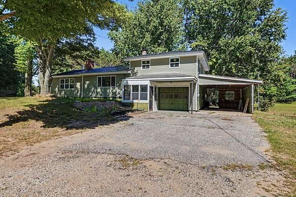 3.25 Acres of Land with Home for Sale in White Cloud, Michigan