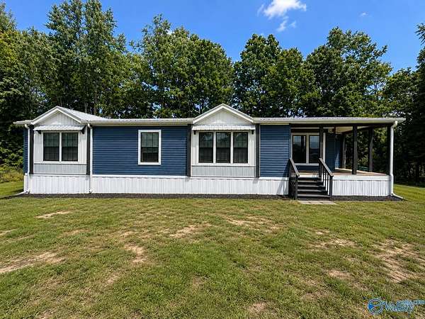 5 Acres of Land with Home for Sale in Falkville, Alabama