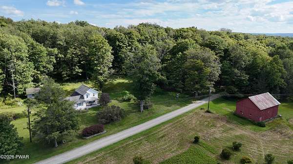 48.5 Acres of Land with Home for Sale in Greentown, Pennsylvania