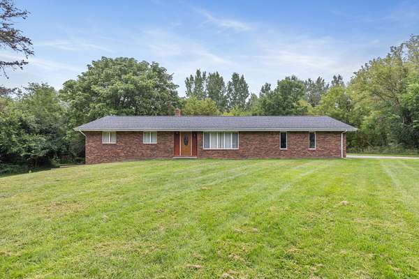 5 Acres of Land with Home for Sale in Eau Claire, Michigan