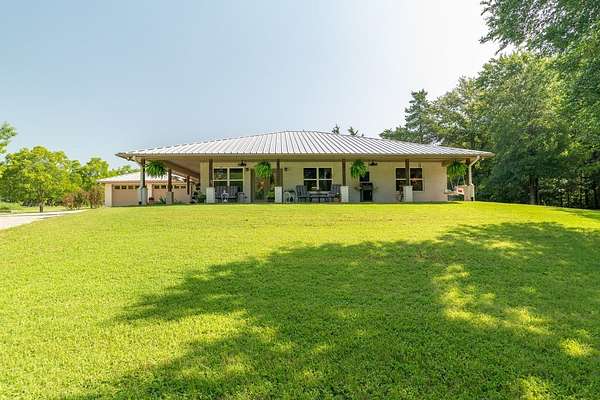 6.86 Acres of Land with Home for Sale in Bonham, Texas
