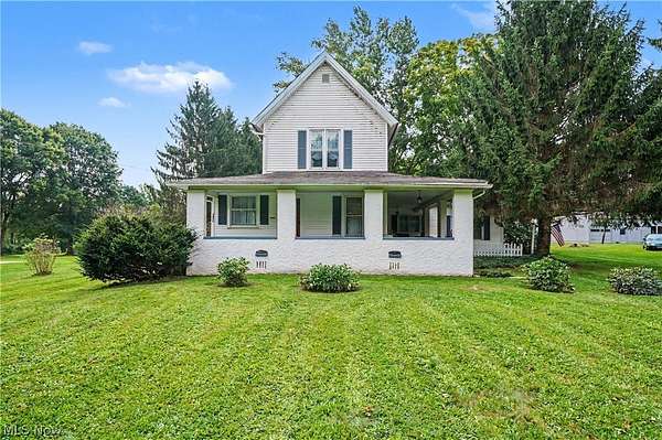 5.28 Acres of Land with Home for Sale in Mogadore, Ohio