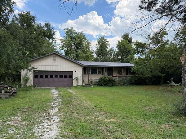 6 Acres of Land with Home for Sale in Marble Falls Township, Arkansas
