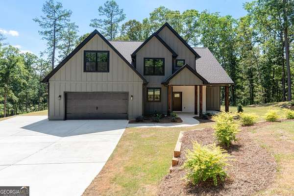 5.4 Acres of Land with Home for Sale in Sharpsburg, Georgia
