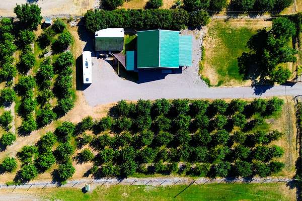 5 Acres of Land with Home for Sale in Bigfork, Montana