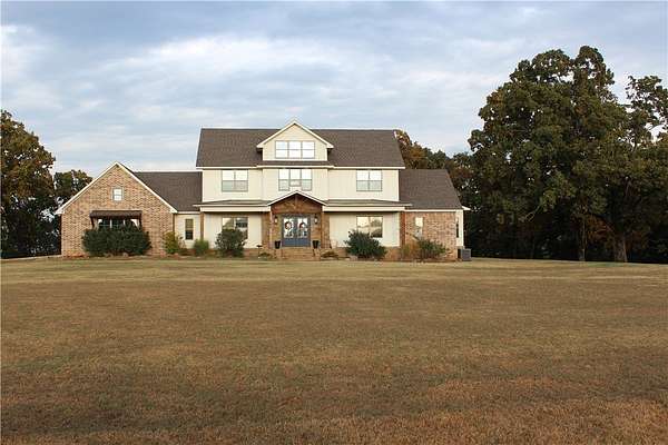 100 Acres of Land with Home for Sale in Paris, Arkansas