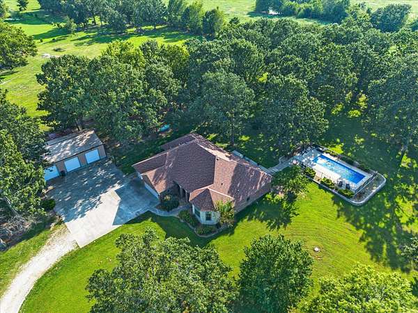 10 Acres of Land with Home for Sale in Rogersville, Missouri