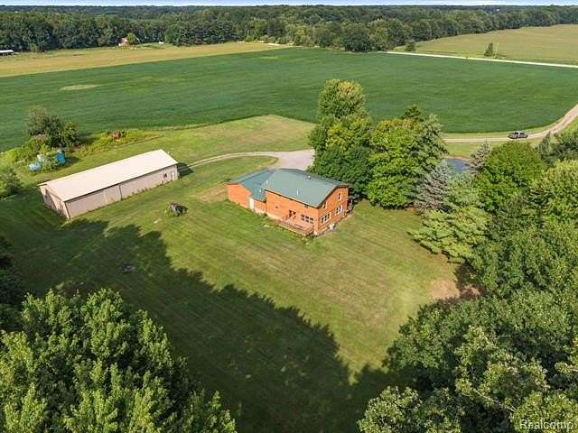 40.7 Acres of Agricultural Land with Home for Sale in Armada Township, Michigan