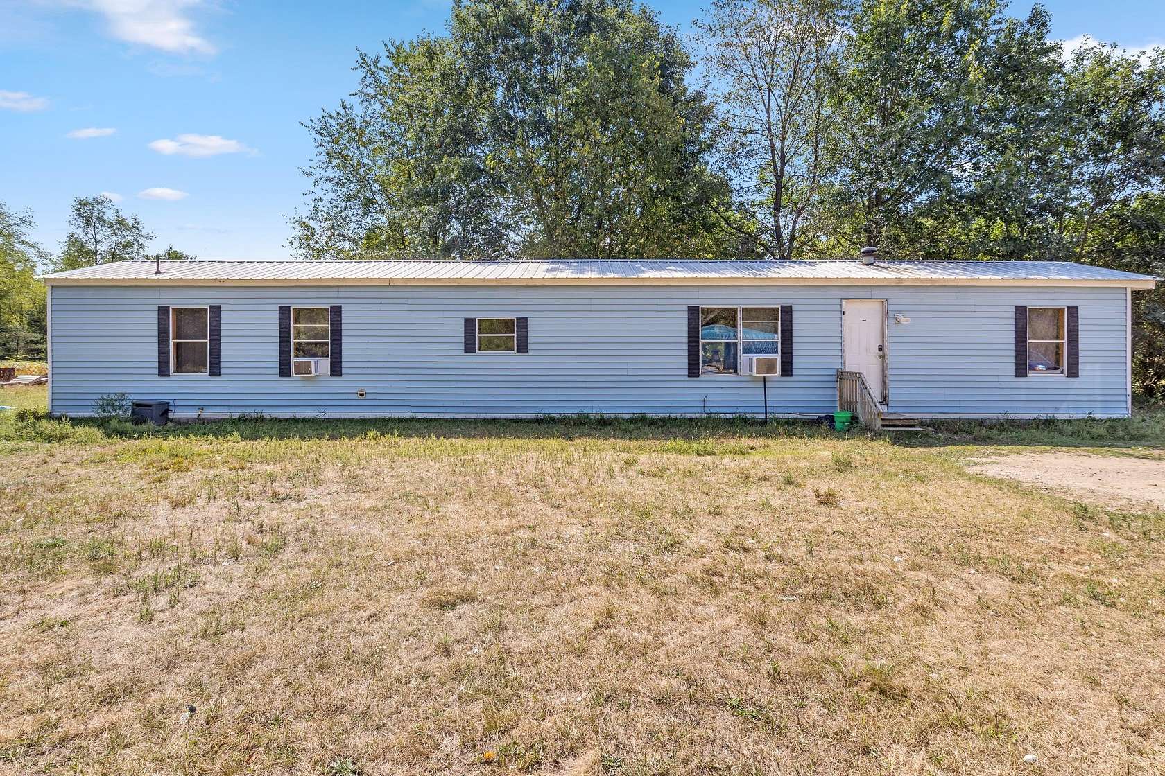 5 Acres of Land with Home for Sale in White Cloud, Michigan