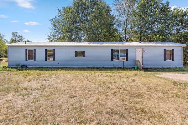 5 Acres of Land with Home for Sale in White Cloud, Michigan