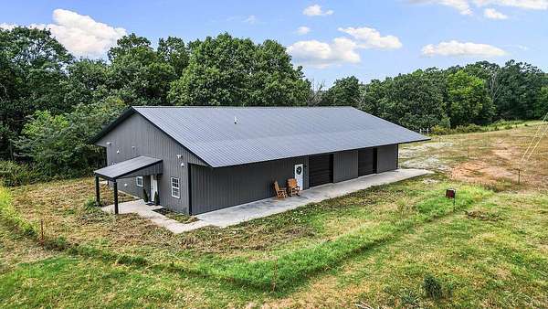 218 Acres of Land with Home for Sale in Seligman, Missouri