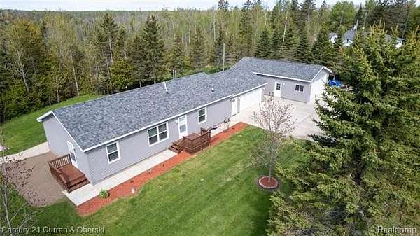 11 Acres of Recreational Land with Home for Sale in Presque Isle Township, Michigan