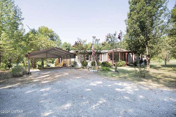 5 Acres of Land with Home for Sale in Henderson, Tennessee