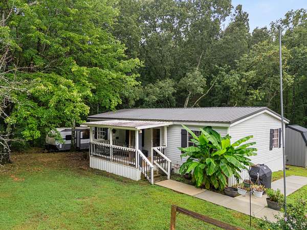 23 Acres of Land with Home for Sale in Huntingdon, Tennessee
