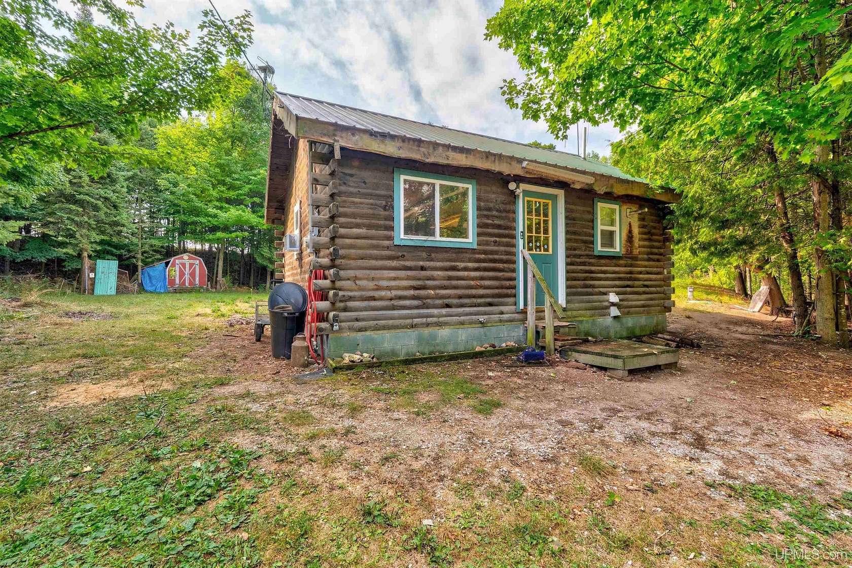 0.75 Acres of Land with Home for Sale in Garden, Michigan