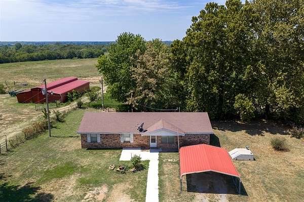 105 Acres of Land with Home for Sale in Okemah, Oklahoma