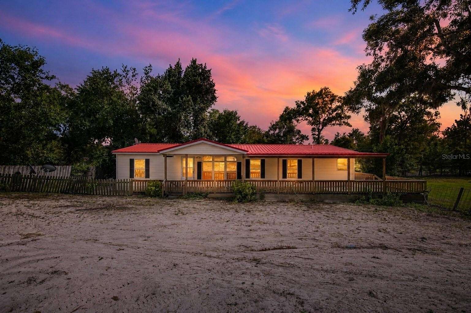 2.5 Acres of Land with Home for Sale in Morriston, Florida