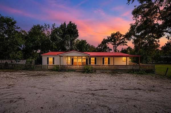 2.5 Acres of Land with Home for Sale in Morriston, Florida