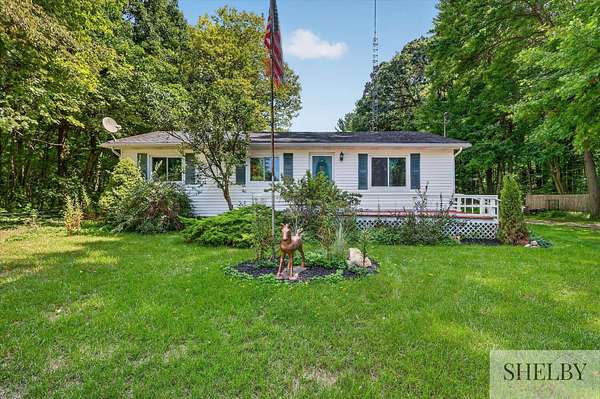 7 Acres of Land with Home for Sale in Kent City, Michigan