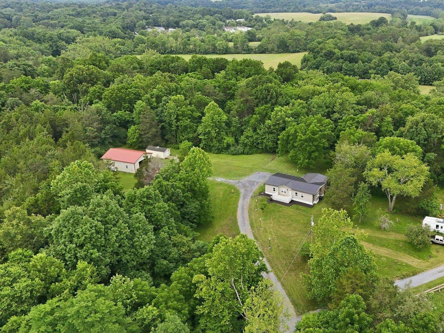 5.57 Acres of Land with Home for Sale in Kearneysville, West Virginia
