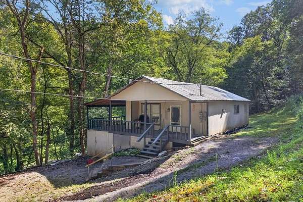 5.9 Acres of Land with Home for Sale in Gainesboro, Tennessee