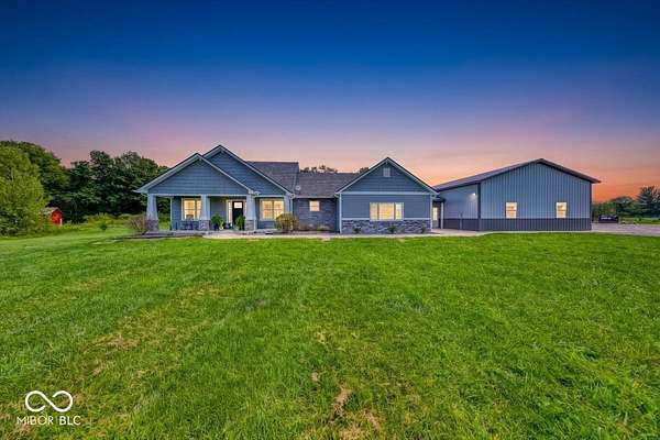 10.7 Acres of Recreational Land with Home for Sale in Trafalgar, Indiana