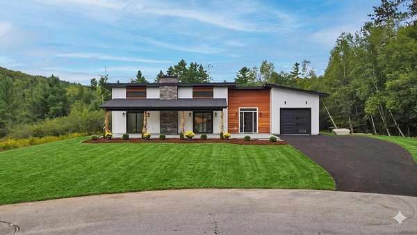 12.1 Acres of Recreational Land with Home for Sale in Thornton, New Hampshire