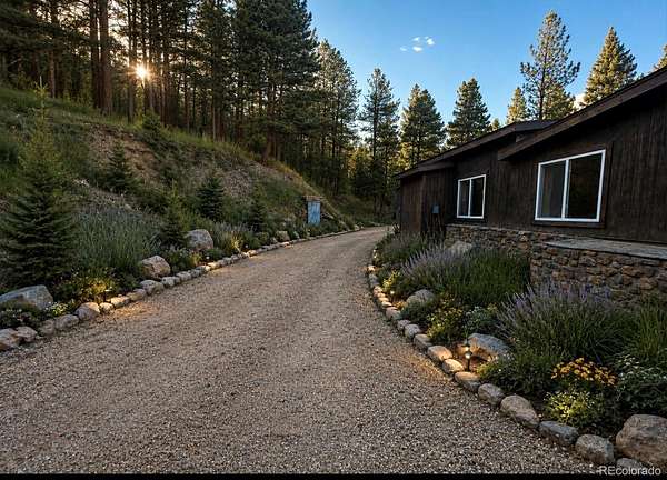 8.32 Acres of Land with Home for Sale in Evergreen, Colorado
