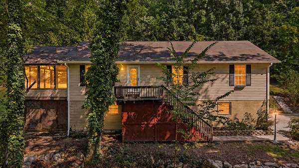 6.8 Acres of Land with Home for Sale in Harrison, Tennessee