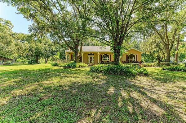 9.54 Acres of Land with Home for Sale in Myakka City, Florida