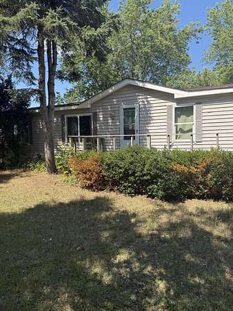 2 Acres of Land with Home for Sale in Walkerville, Michigan