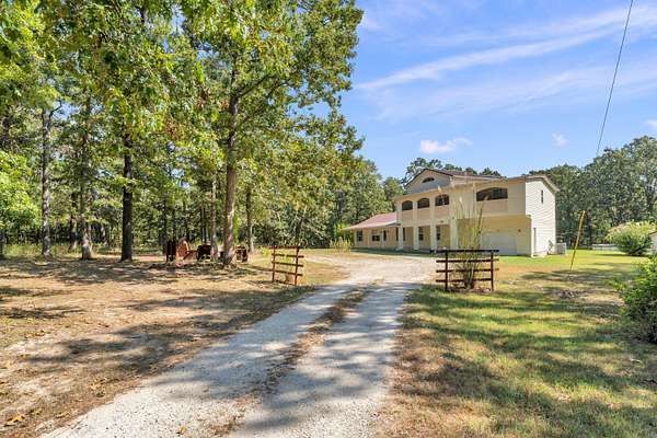 8.29 Acres of Land with Home for Sale in Buffalo, Missouri