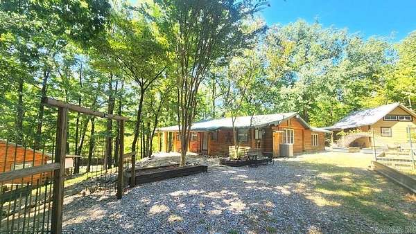 23 Acres of Recreational Land with Home for Sale in Black Springs Township, Arkansas